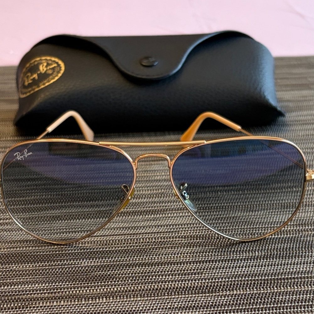 Ray-Ban Gold Frame Sunglasses with Blue Gradient Lenses.